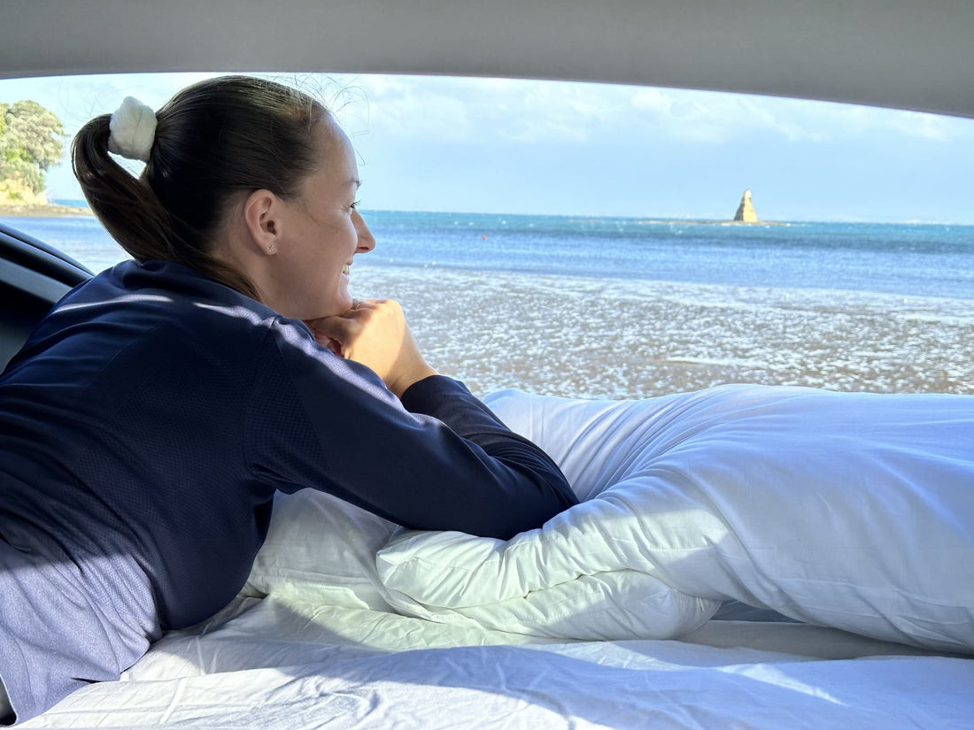 Solo female traveller resting inside SUV with Teraglide platform