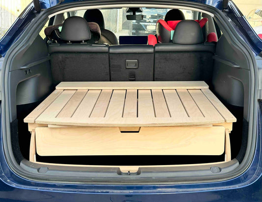 Compare Teraglide Core and Pro platform beds for Tesla camping: compact design, comfort, and durability. Choose Core for simplicity or Pro for enhanced features!