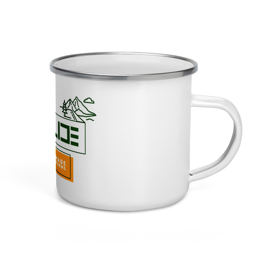 Durable enamel camper mug with silver rim. Ideal for outdoor adventures. Easy to clean, lightweight, and multifunctional for drinks or food.