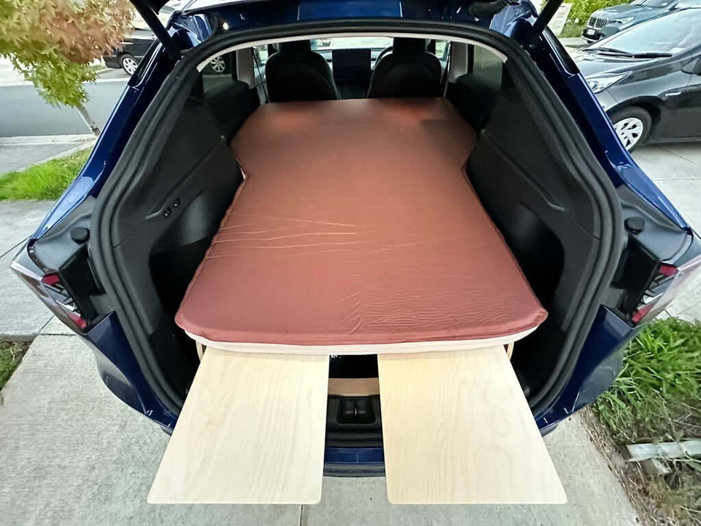 Self-inflating memory foam mattress for car camping. Provides comfort and fits in the trunk or boot for easy storage and travel.