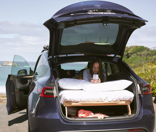  Transform your Tesla Model Y for camping with our premium platform beds. Perfect for couples or families, offering comfort, storage, and easy setup.