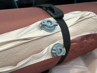 Self-inflating memory foam mattress for car trunks. Ideal for maximizing sleep space on road trips. Stores easily in a front trunk or boot.