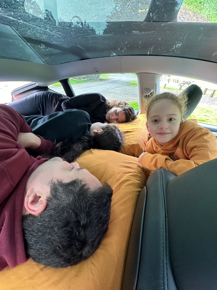 Drawer and platform system for car camping — organized storage with sturdy flat surface for sleeping or relaxing.