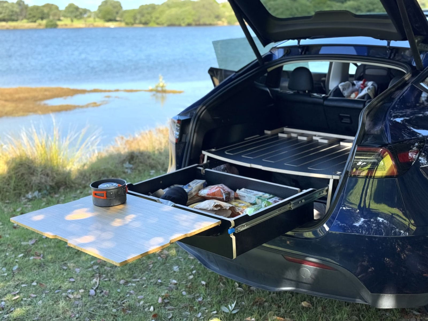 Close-up of bamboo clip-on table on Teraglide PRO car camping platform