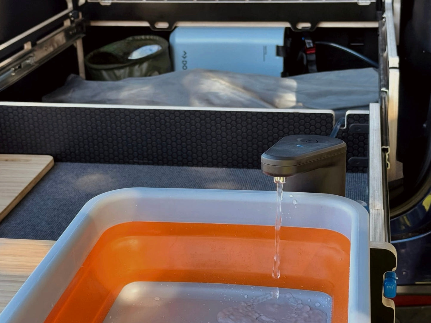 Teraglide PRO camping setup with Dometic water jug and sink