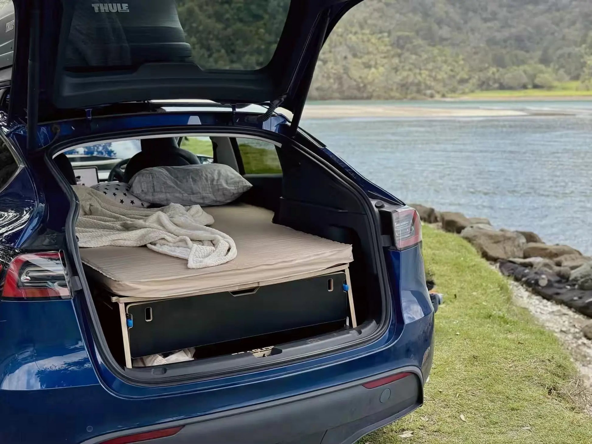 Teraglide PRO car camping platform ready to travel in Tesla Y trunk