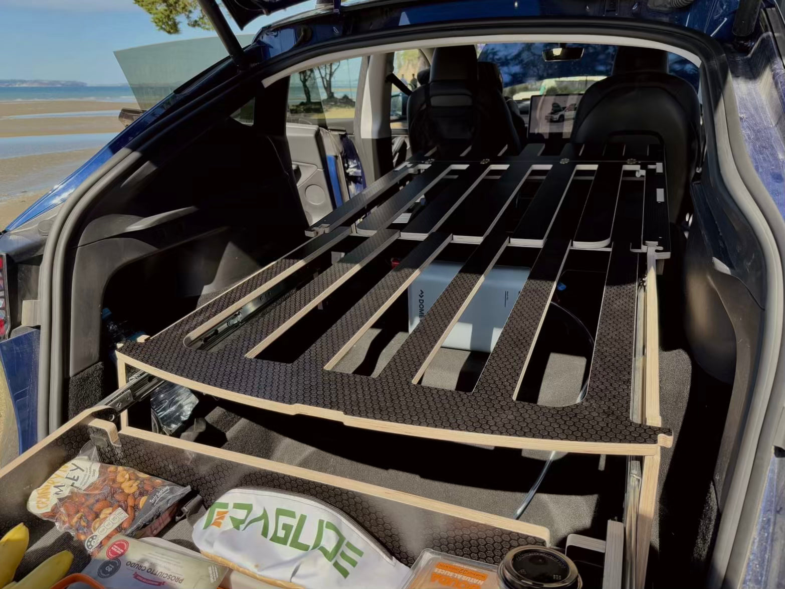 Teraglide PRO car camping platform ready to travel in Tesla Y trunk