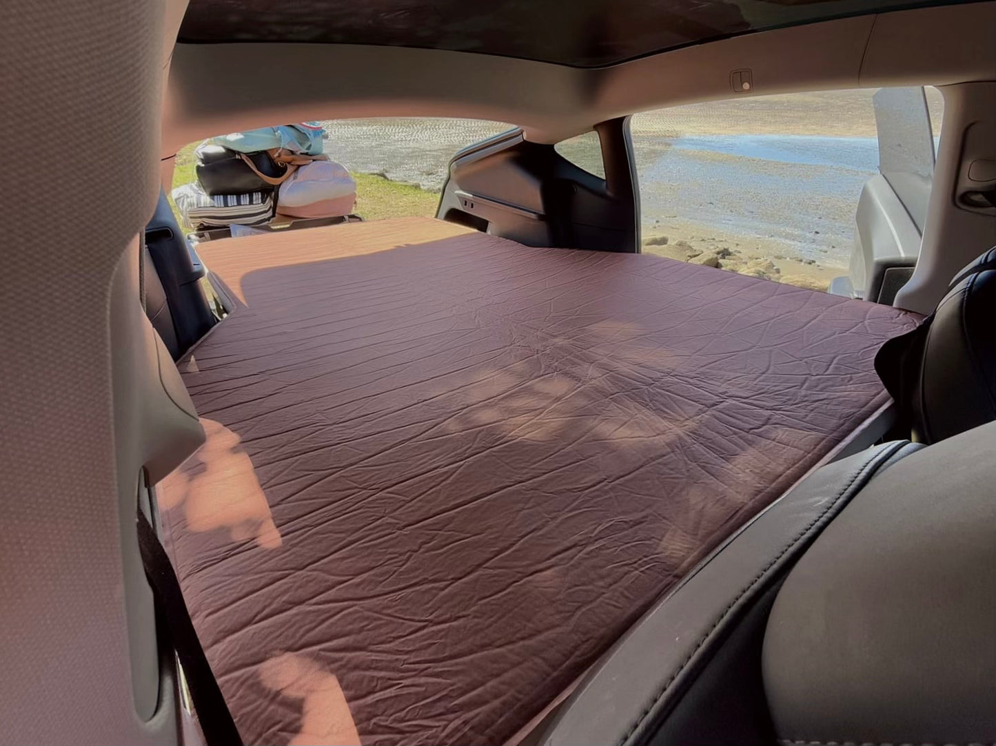 Teraglide PRO sleeping setup inside Tesla Model Y