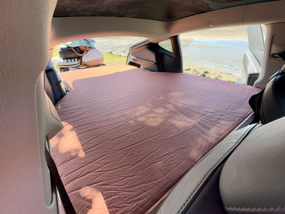 Teraglide PRO sleeping setup inside Tesla Model Y