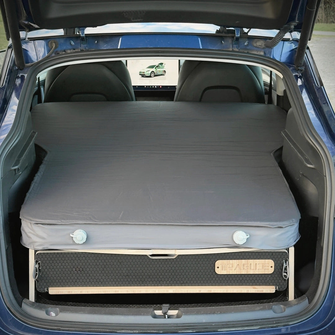 Grey mattress laid on the Teraglide PRO platform in a Tesla Model Y