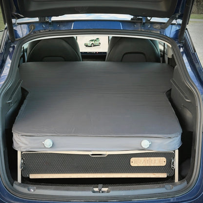 Grey mattress laid on the Teraglide PRO platform in a Tesla Model Y