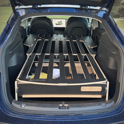 Teraglide PRO slatted sleeping deck fully extended inside a Tesla Model Y